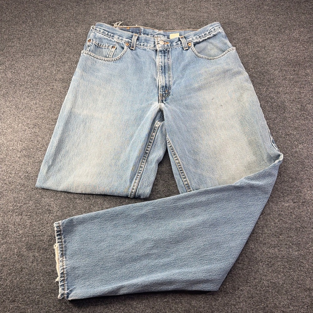 Vintage Levis 560 Loose Fit Tapered Leg Jeans Light Wash Made in USA 34x34